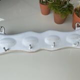 Enamelled sheet metal with inscriptions and hooks