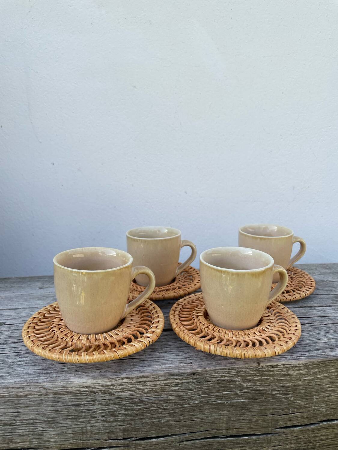 Ceramic and rattan coffee cups