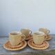 Ceramic and rattan coffee cups