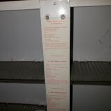 White lacquered metal medicine cabinet