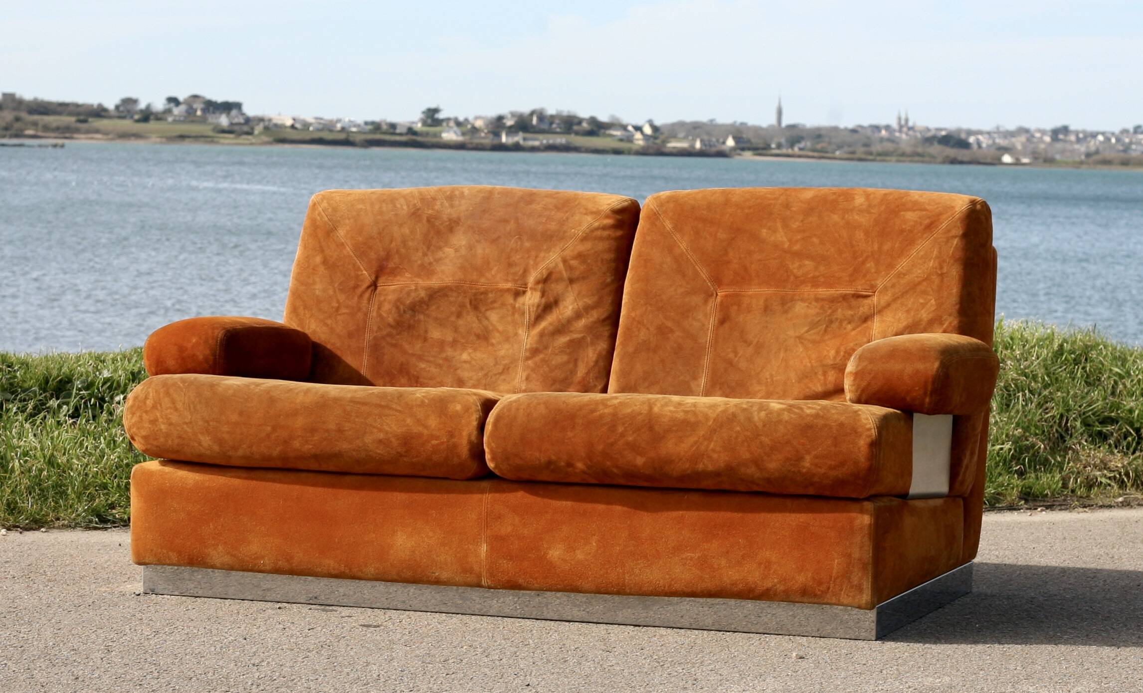 Orange suede leather and steel sofa. Circa 1970