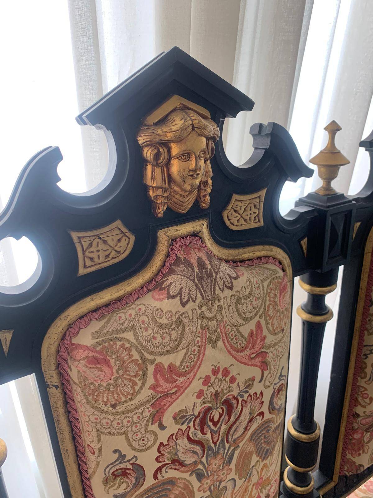 Historicist three-seater canapé in ebonised wood.