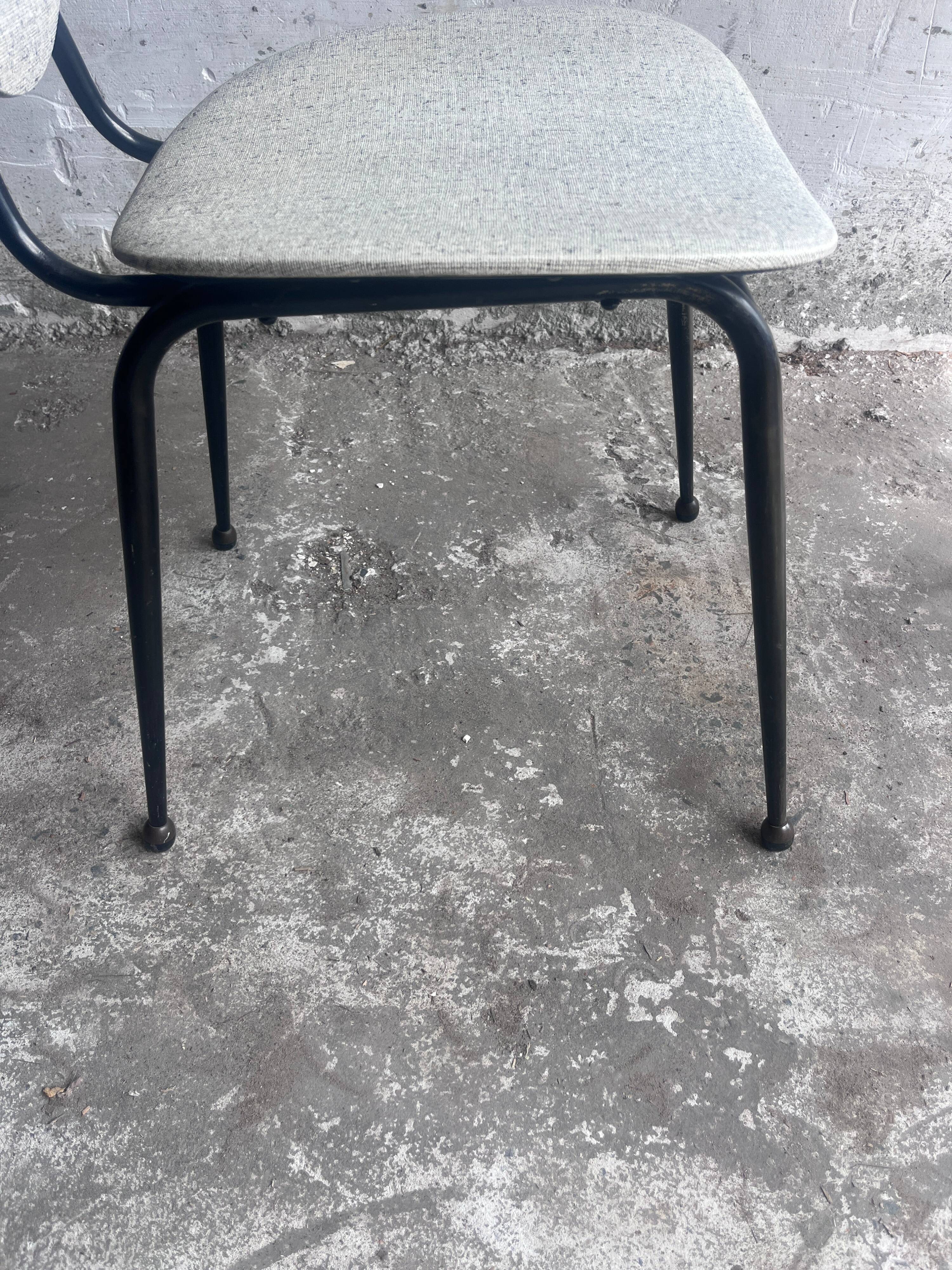 Elegant pair of French dining chairs by Jacques Hitier from the 1950s.