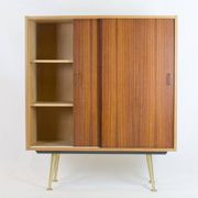 Wardrobe with sliding doors by Deutsche Werkstätten München