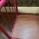 pink metal doll bed
