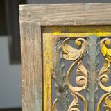 Rectangular Indonesian construction element with blue and yellow plant in carved wood