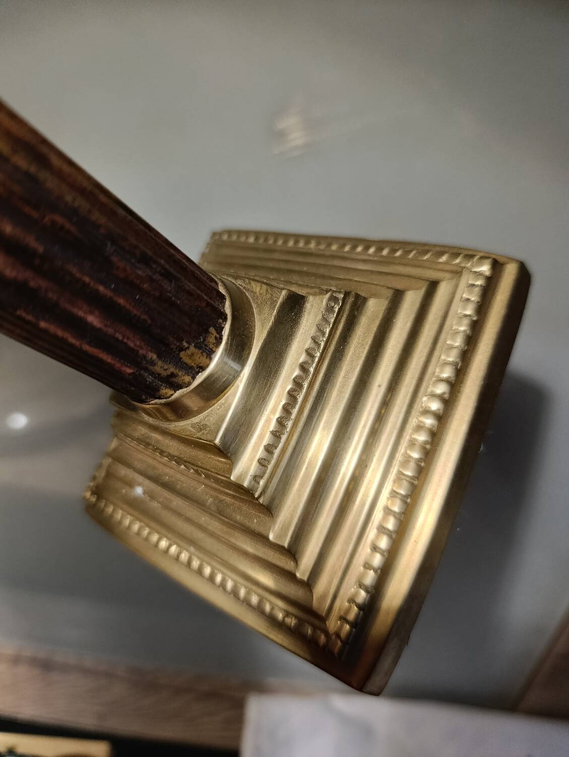 Golden brass candlestick, Corinthian style, vintage