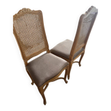 Four antique chairs in classic style with caning and upholstery.