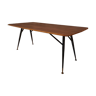 Dining table in teak wood and feet in painted metal.