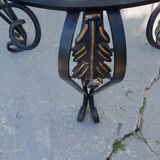 Wrought iron and glass round table