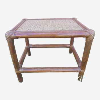 Small rattan side table end of sofa