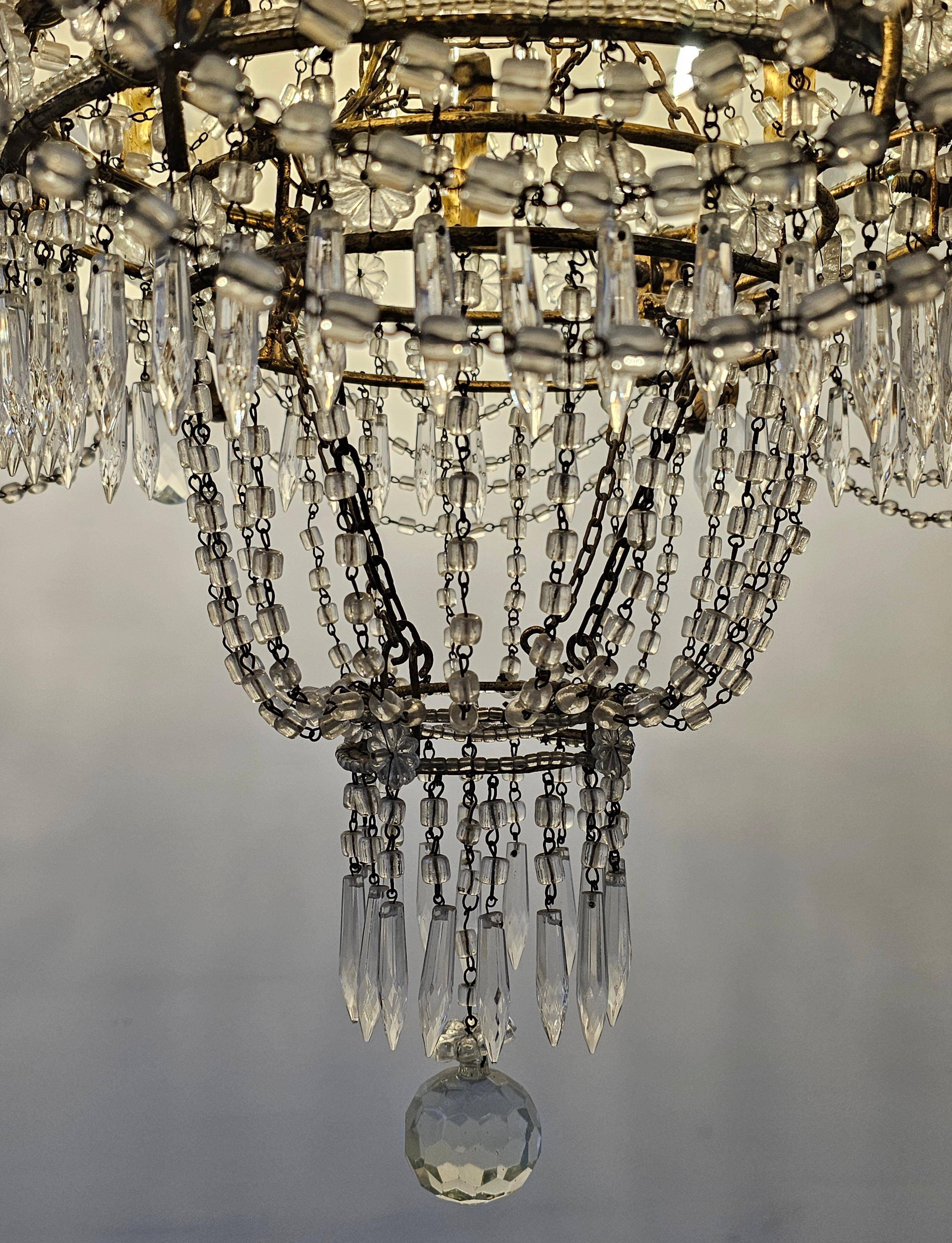 Antique crystal chandelier with floral details 1910