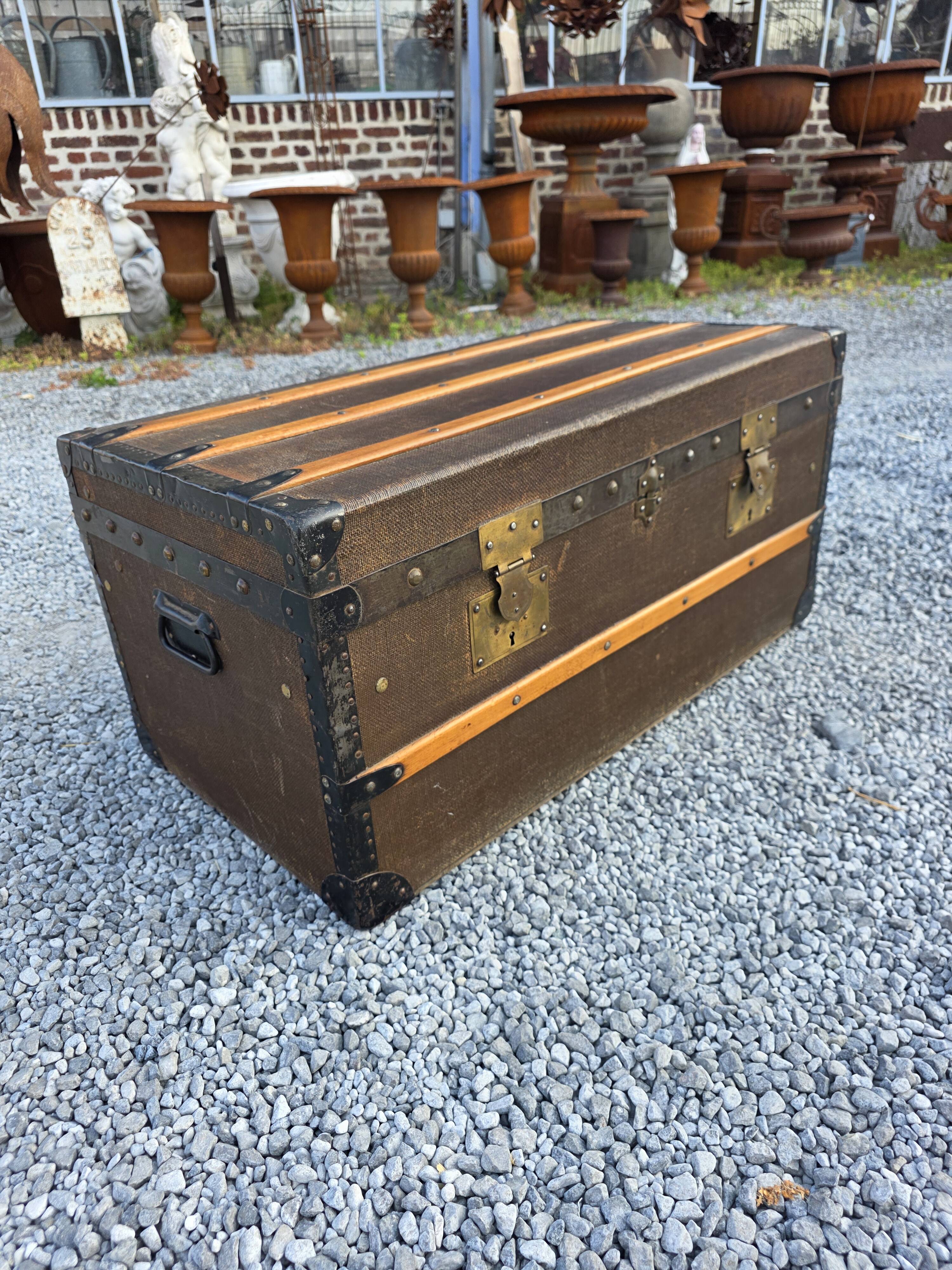 Old travel trunk in oilcloth