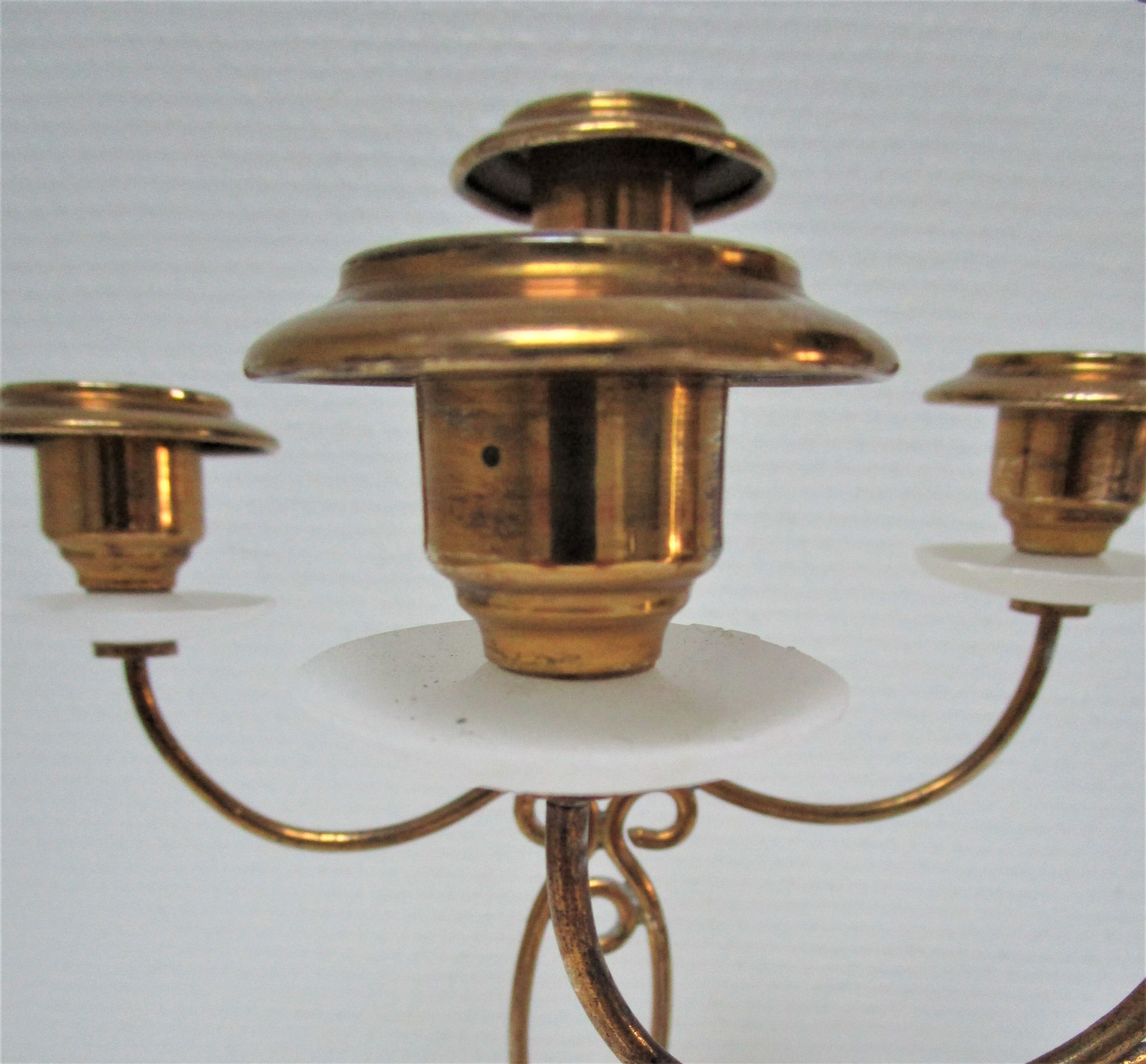 Pair of brass and three-pointed stone candelabra candle holders early twentieth century