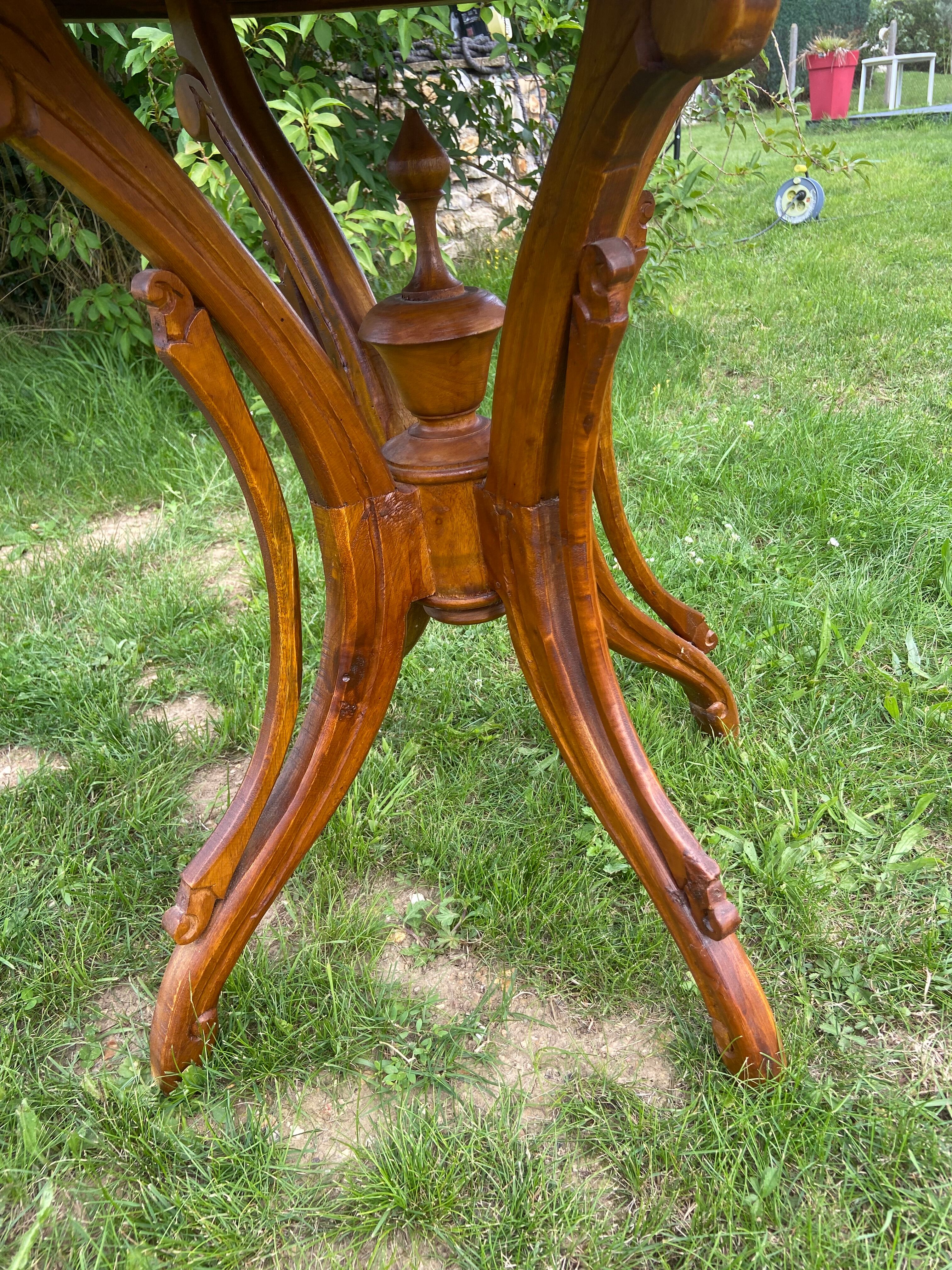 Round table and wrought iron chair
