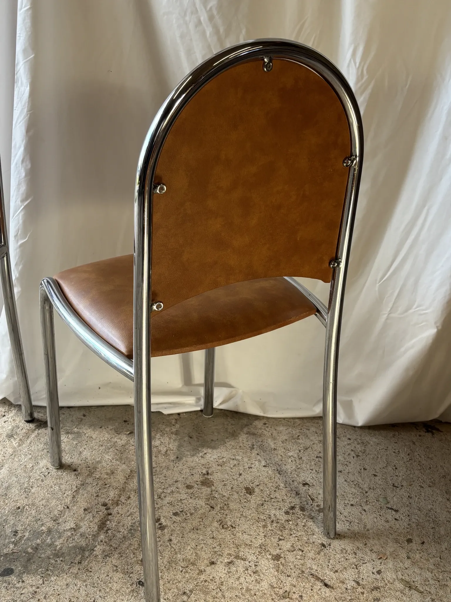 Set of 4 vintage tubular chrome chairs
