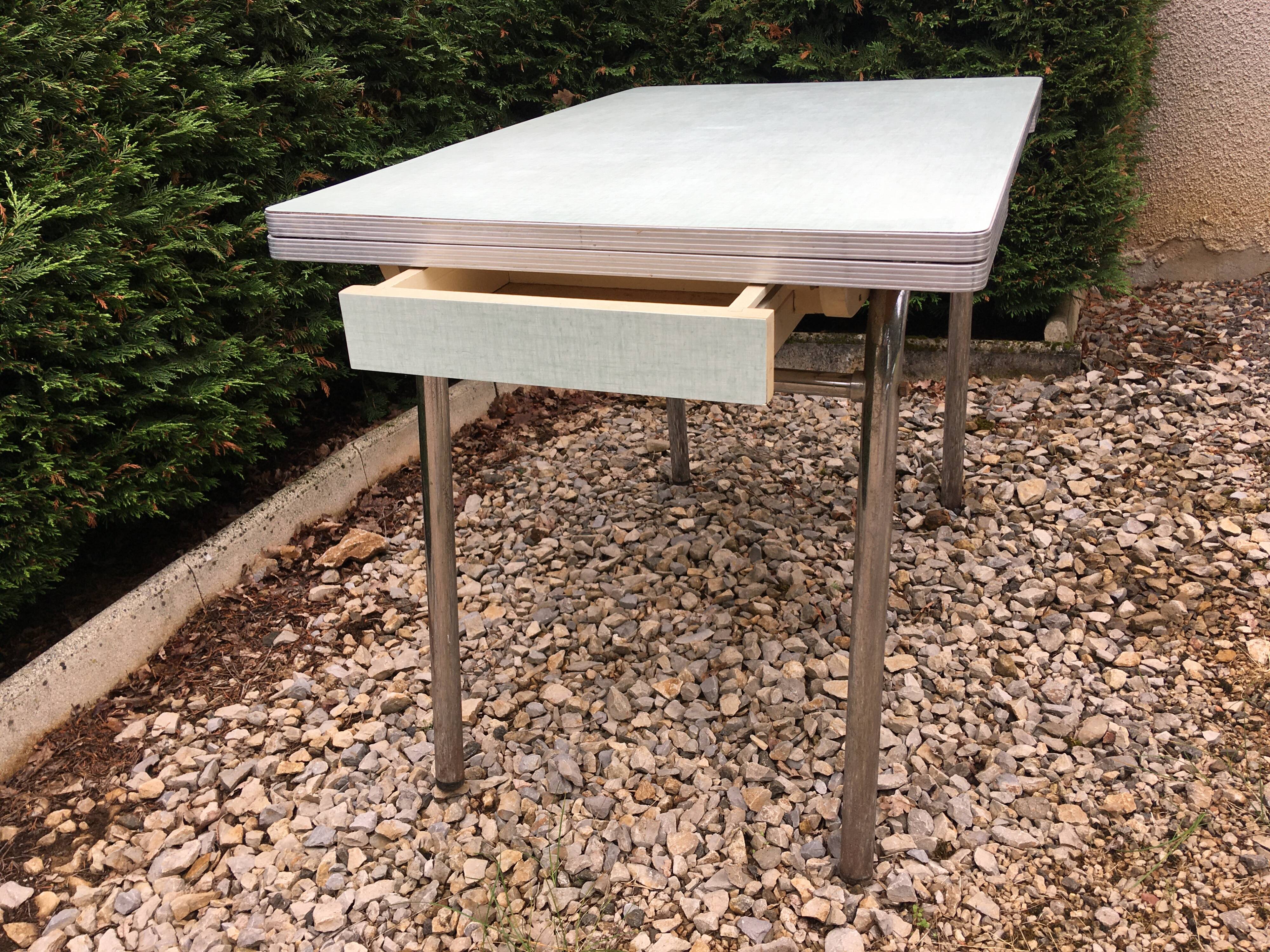 Formica table set with extensions + 4 Plastilux chairs