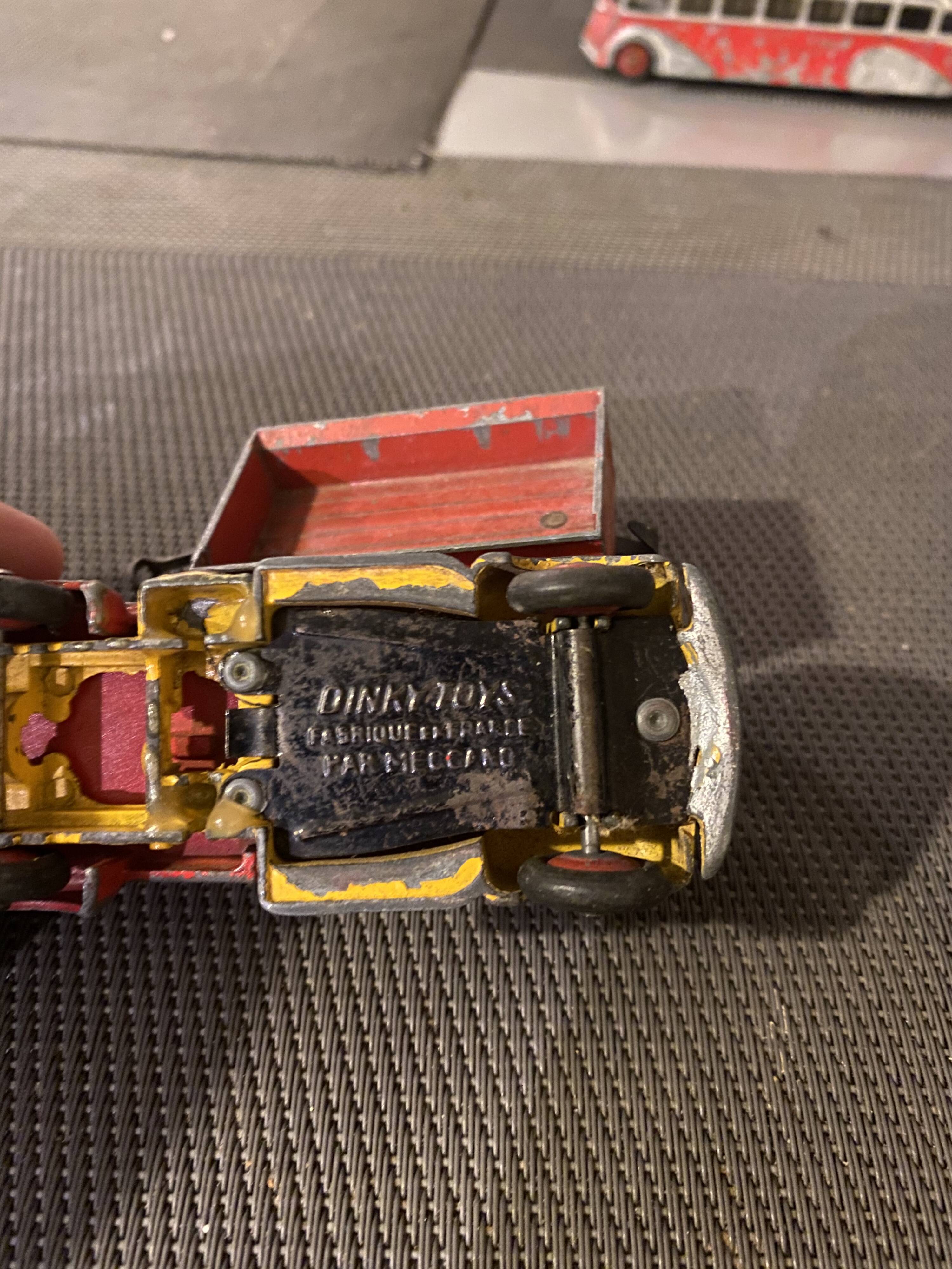 Dinky Toys dump truck and red trailer