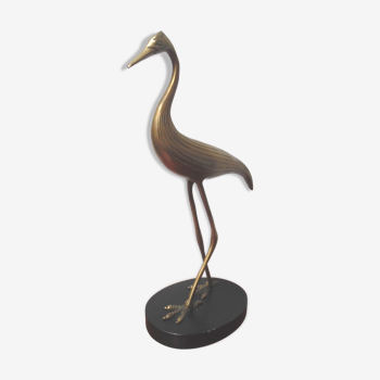 Brass heron standing