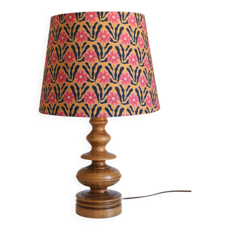 Turned wooden base lamp with printed lampshade