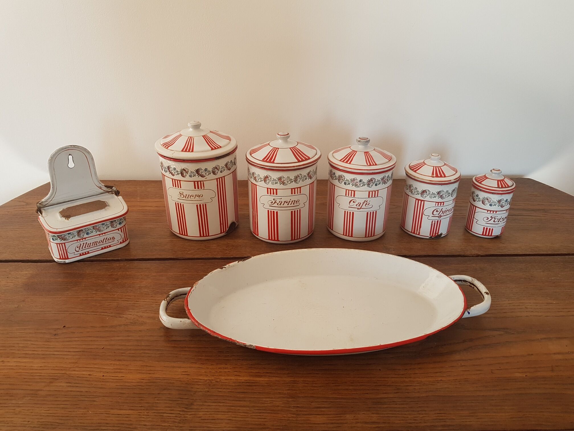 Old series of enamelled sheet metal spice pots