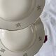 6 antique cream and gold earthenware deep plates by Villeroy and Boch.