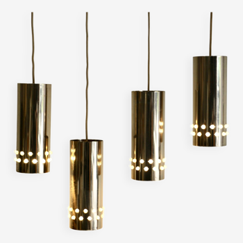 Four gilded metal pendant lights. France 80s