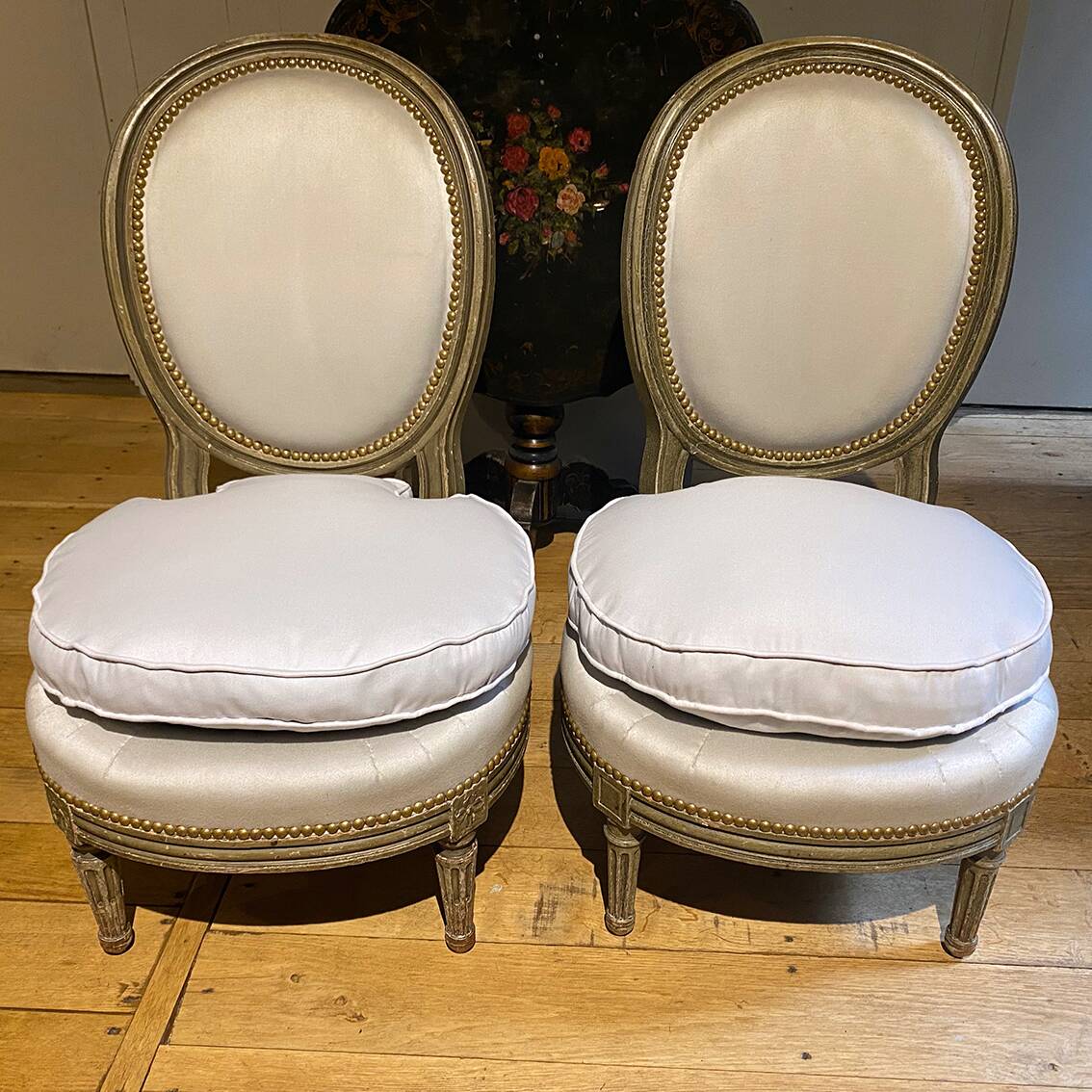 Pair of Louis XVI style armchairs with medallion backs, circa 1900