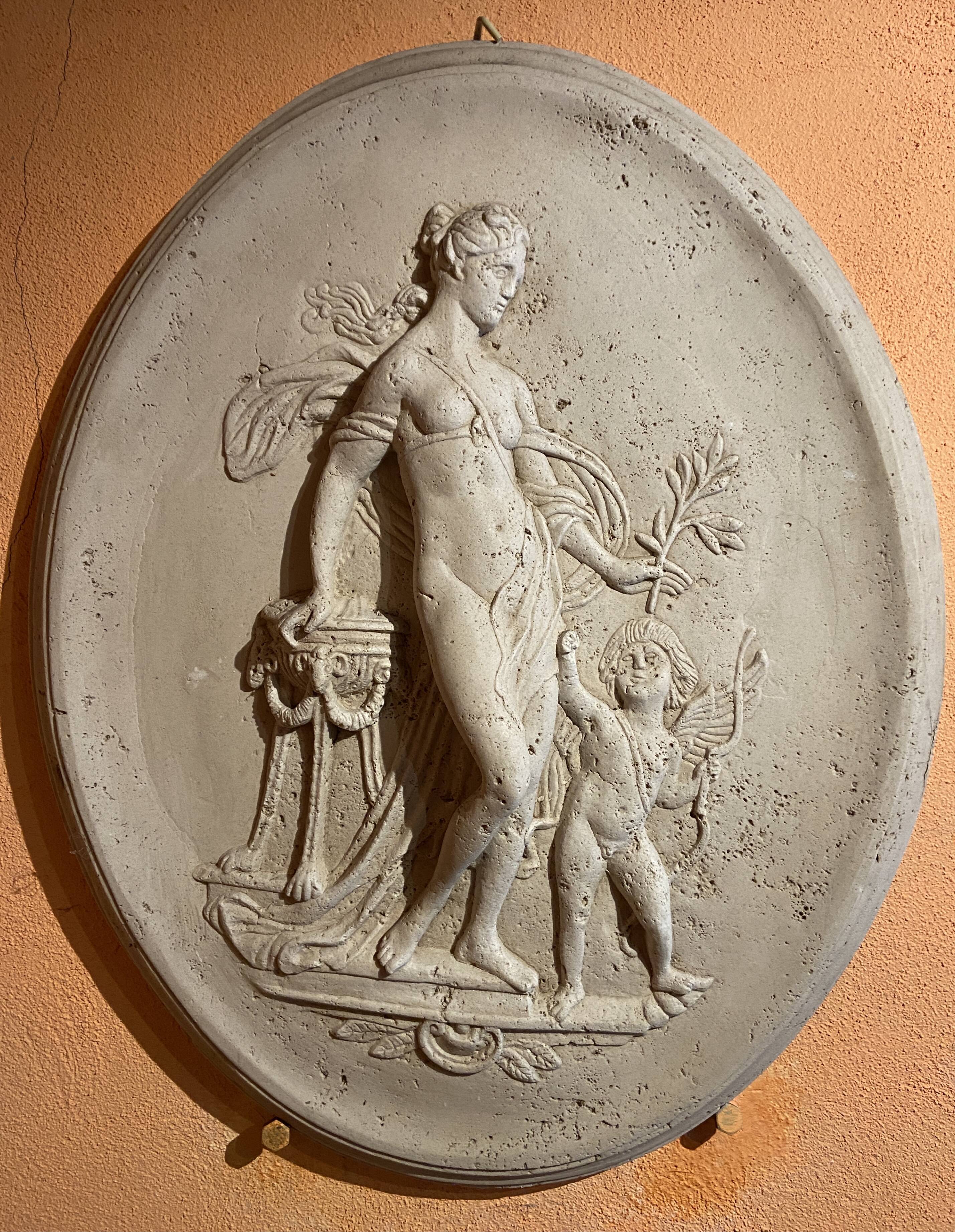 Imposing Oval bas-relief style Antique Italian travertine
