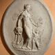 Imposing Oval bas-relief style Antique Italian travertine