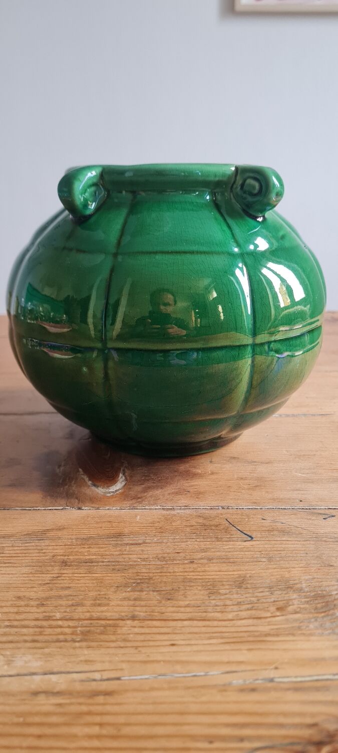 Green glazed earthenware vase