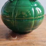 Green glazed earthenware vase