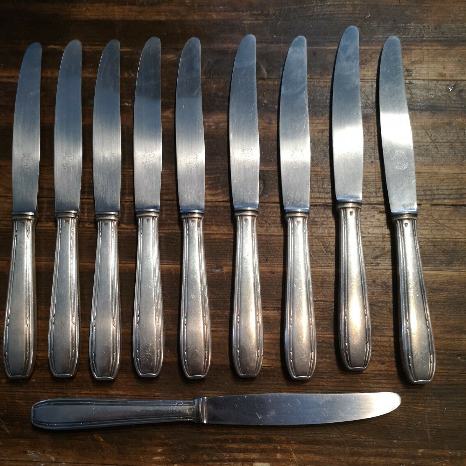Series of 10 knives with silver metal stainless steel blade