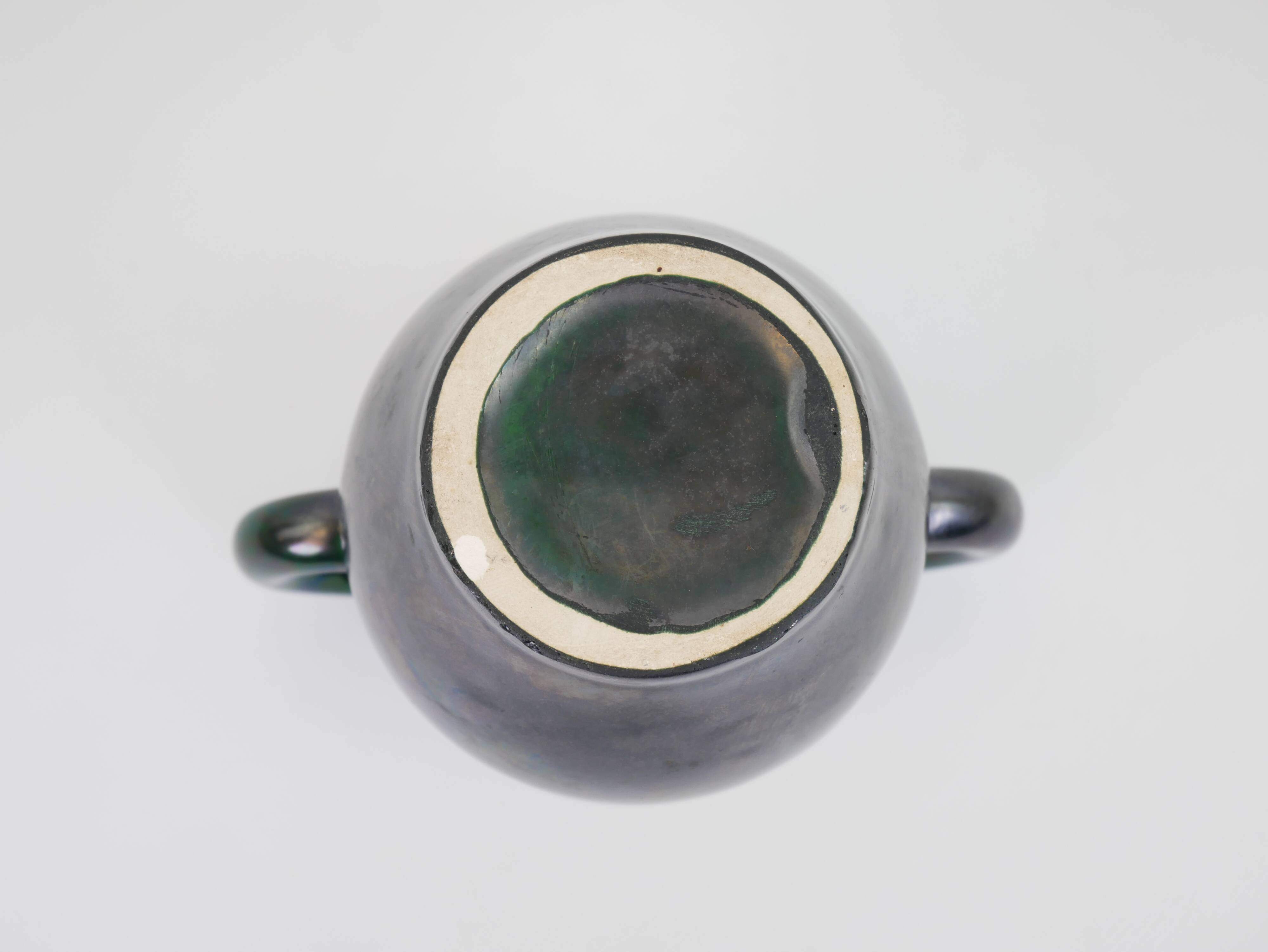 Black and green ceramic vase