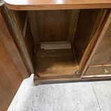 According to André Arbus, a sideboard in a row from the Art Deco period in blonde mahogany.