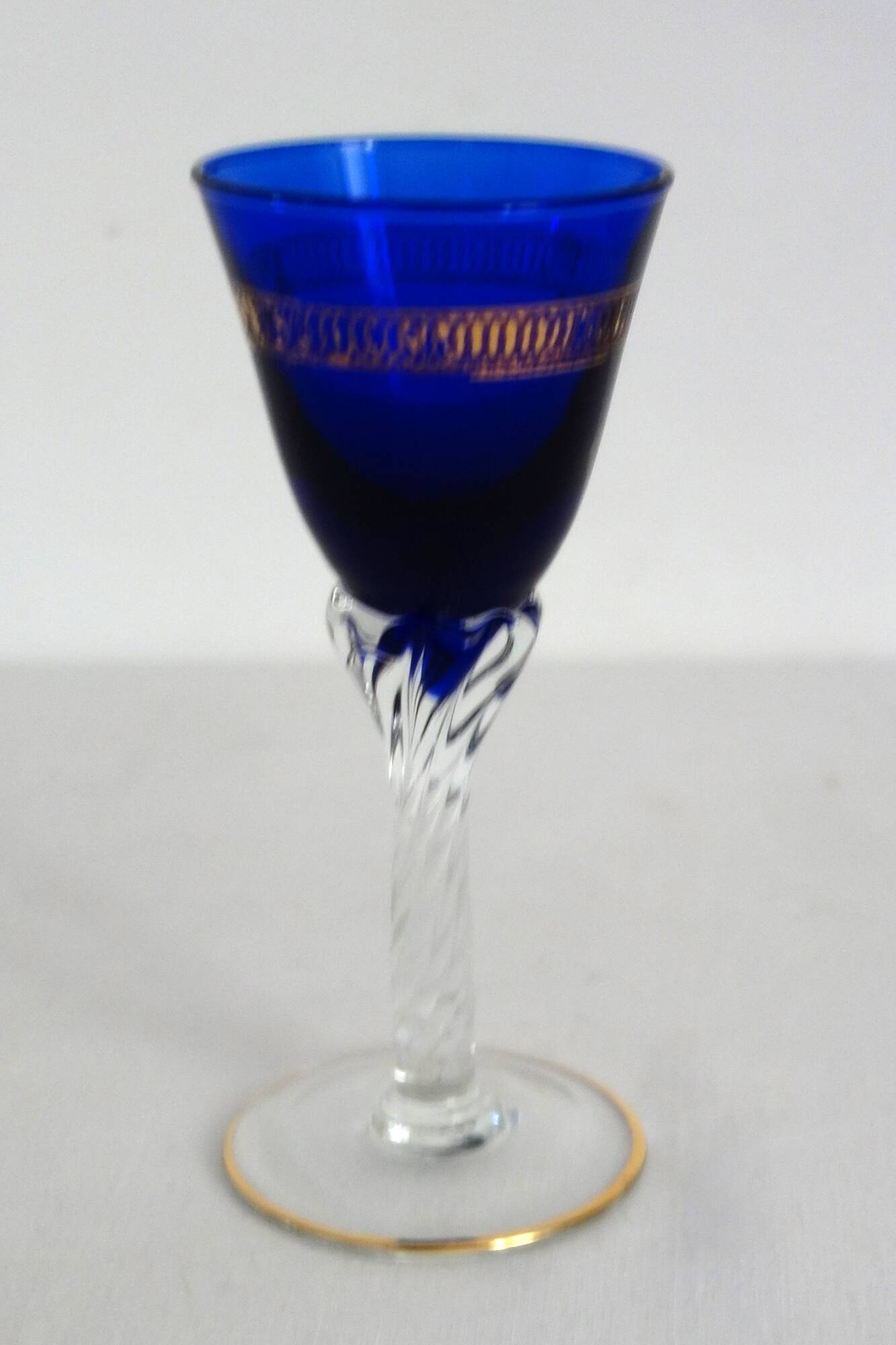 6 multicolored aperitif glasses with twisted legs