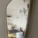 Asymmetrical free-form mirror from the 70s