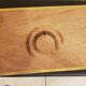 Braided wooden top gilded handles