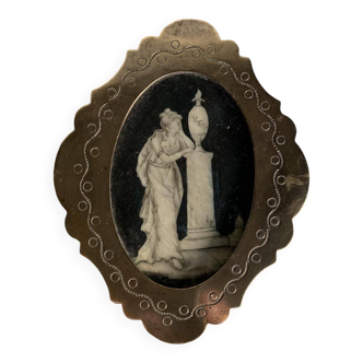 Miniature on ivory, oval brass frame.