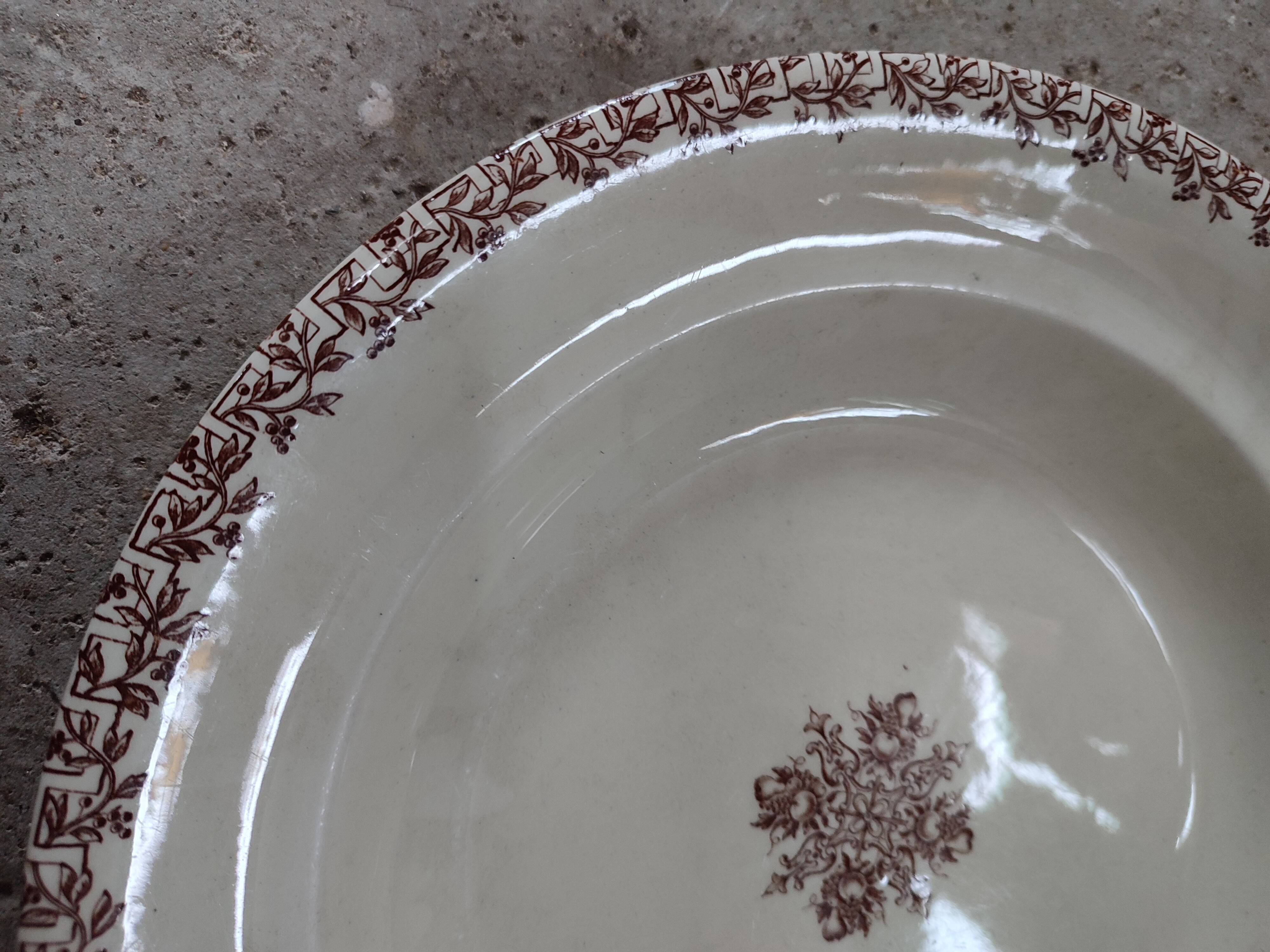 Old iron earth serving dish