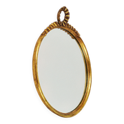Round wall mirror in gilded wood, mid-century, C. Allodi & G. Subelli, Italy, 1950s.