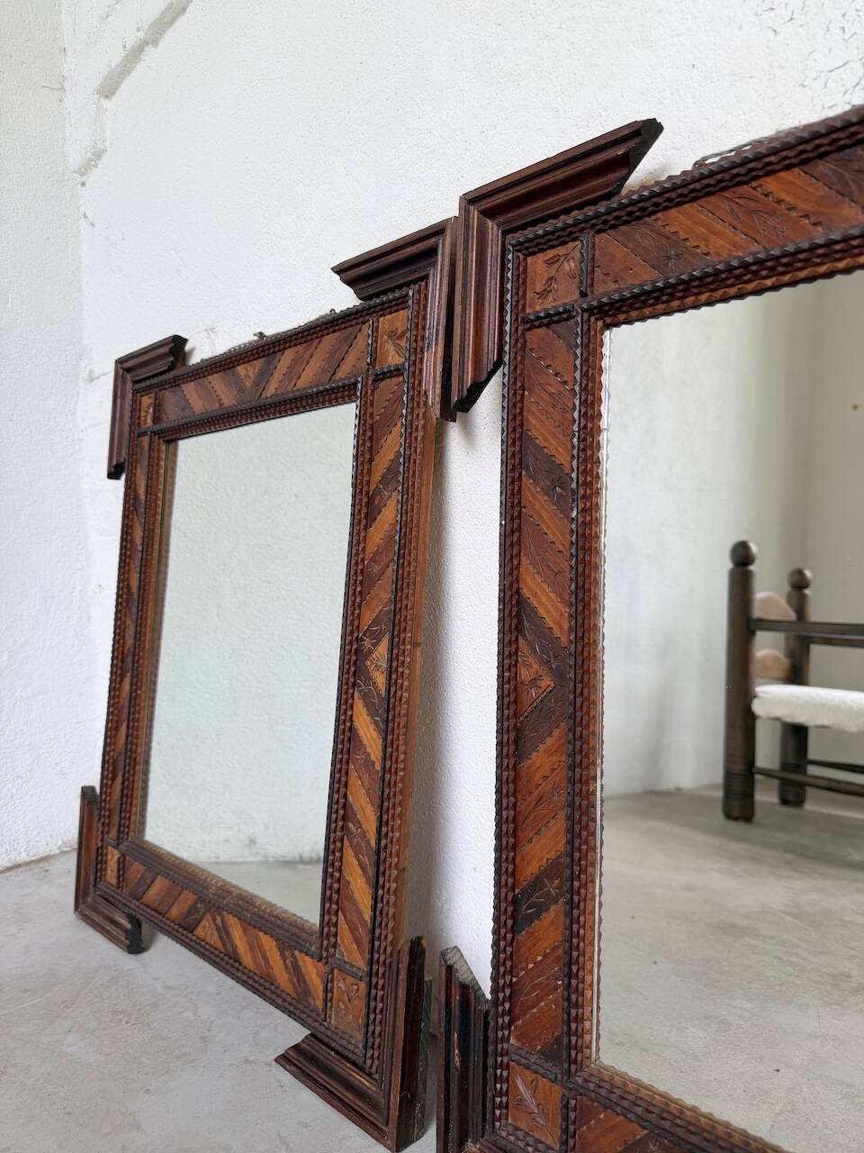 Pair of wooden mirrors in tramp art style
