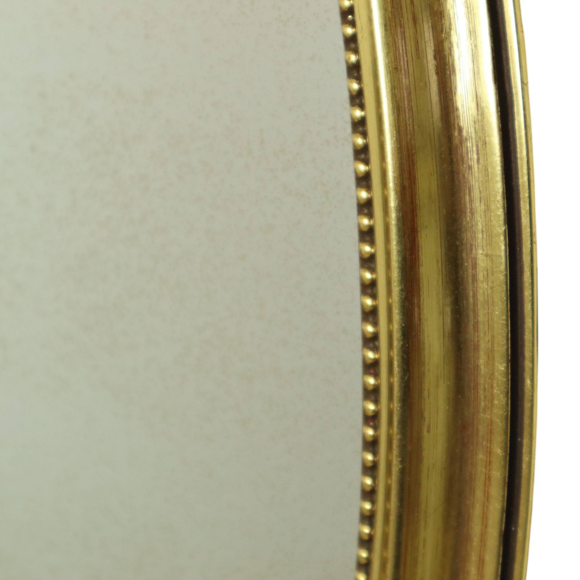 Miroir ovale classique doré à décor de ruban, France