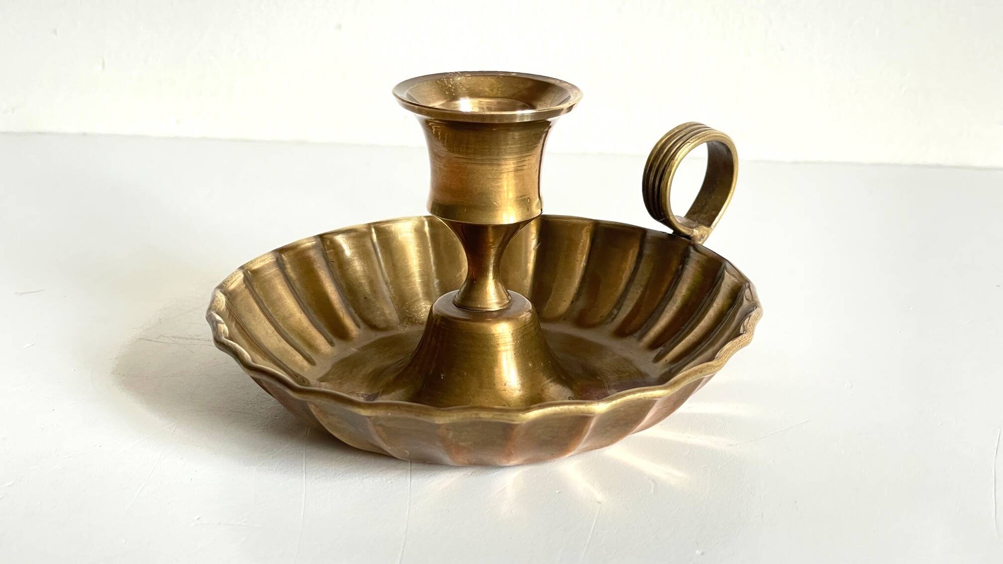 Vintage solid brass hand candle holder