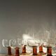 Lot of 9 glasses/cups from the 70s with amber feet