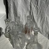 Small cylindrical glass whiskey decanter H:23