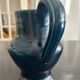 blue pitcher the potter chin