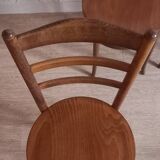 Set of 4 Baumann bistro chairs with round seats.