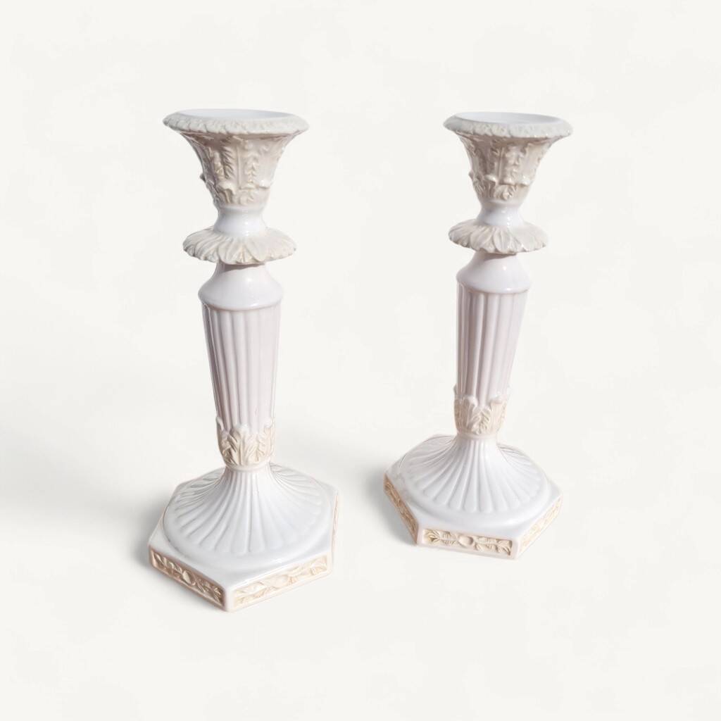 Pair of antique Italian ceramic candlesticks.
