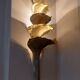 Wall lamp design in gilded metal, leaf décor
